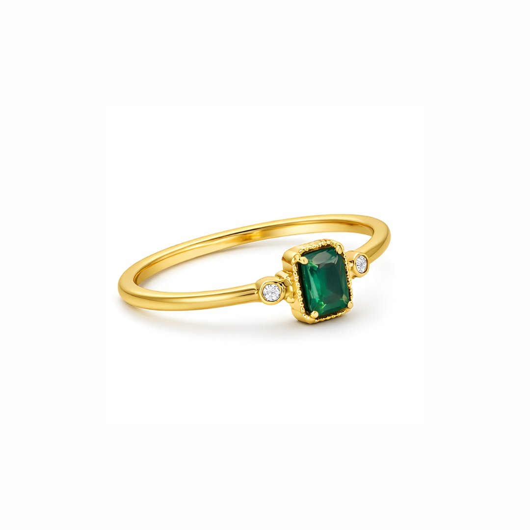 S925 gold-plated ring with emerald-cut green stone and side accents